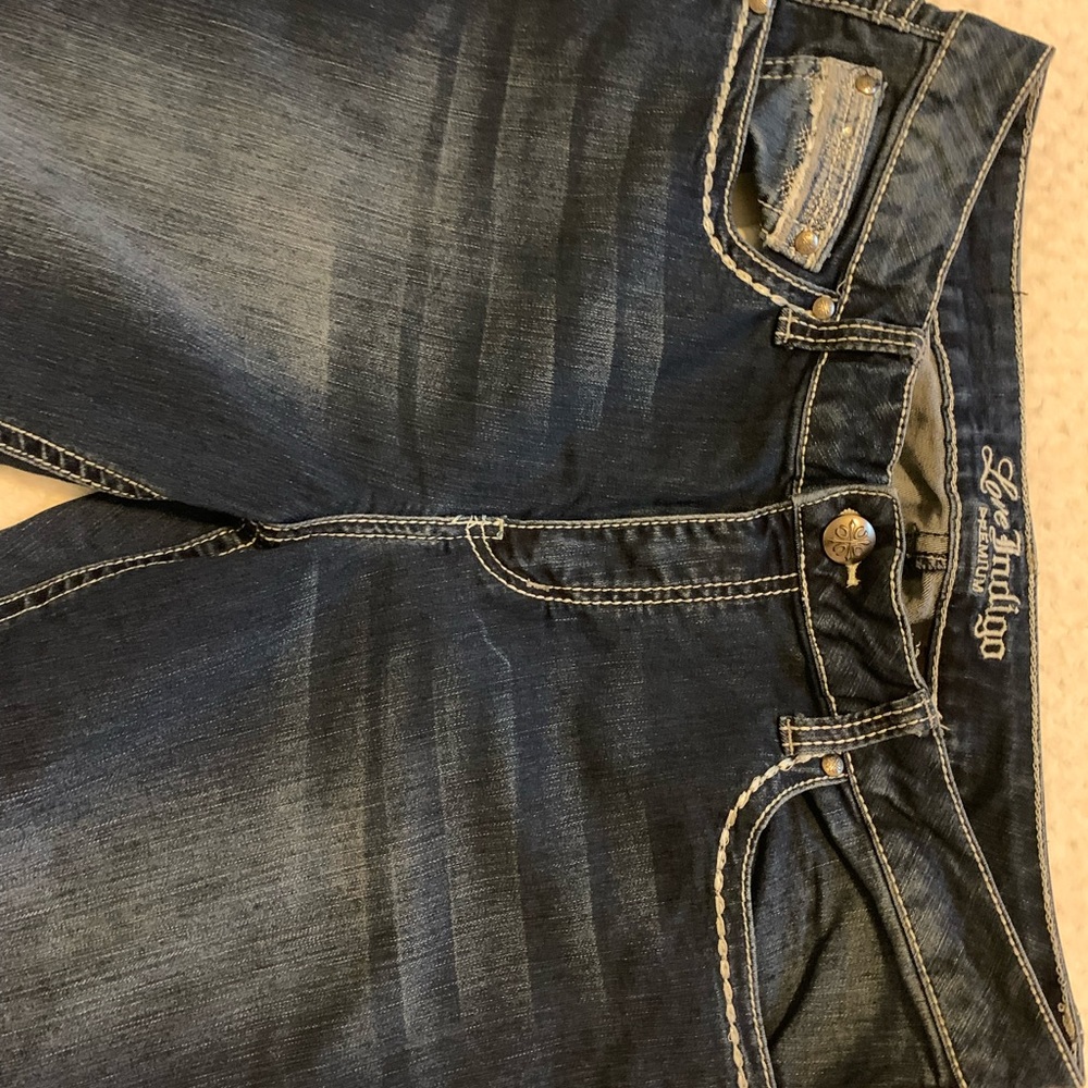 Love indigo Women’s Mid-waist bootcut jeans, size 14, prewashed, length 32.
